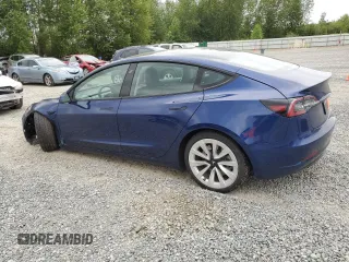 2023 Tesla Model 3 with VIN 5YJ3E1EA7PF450973, listed as a Copart auction lot 61082175 with 47,029 mi miles and Salvage title. Bid and sale history available at DreamBid. Image 2.