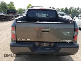 2012 Honda Ridgeline RTL z VIN 5FPYK1F59CB001005, wystawiony jako Copart lot #59713305 z przebiegiem 204 963 mil mil oraz Szkoda całkowita • Salvage title. Historia ofert i sprzedaży dostępna na DreamBid. Obrazek 6.