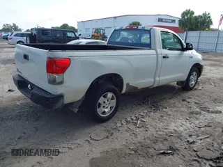 2010 Toyota Tundra with VIN 5TFLU5F10AX022832, listed as a IAAI auction lot 42504366 with 223,392 mi miles and . Bid and sale history available at DreamBid. Image 4.