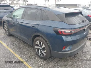2023 Volkswagen ID.4 Pro z VIN 1V2CMPE88PC028158, wystawiony jako IAAI lot #41538391 z przebiegiem 7159 mil mil oraz . Historia ofert i sprzedaży dostępna na DreamBid. Obrazek 3.
