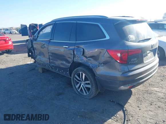 2017 Honda Pilot Touring with VIN 5FNYF5H97HB023919, listed as a IAAI auction lot 41864959 with 70,360 mi miles. Bid and sale history available at carsss.com. Image 3.