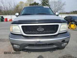 2003 Ford F-150 XL with VIN 1FTRX18L23NA66919, listed as a Copart auction lot 52911285 with 153,870 mi miles and Salvage Title. Bid and sale history available at carsss.com. Image 5.