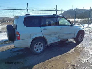 2003 Suzuki XL7 Touring z VIN JS3TX92V734100178, wystawiony jako IAAI lot #41386492 z przebiegiem 91 912 mil mil oraz . Historia ofert i sprzedaży dostępna na DreamBid. Obrazek 4.
