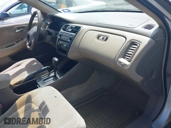 1999 Honda Accord LX z VIN 1HGCG5648XA164103, wystawiony jako IAAI lot #42020624 z przebiegiem 244 346 mil mil oraz . Historia ofert i sprzedaży dostępna na DreamBid. Obrazek 5.