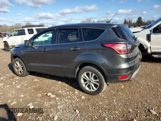2017 Ford Escape SE with VIN 1FMCU9G91HUC16935, listed as a Copart auction lot 79975404 with 100,361 mi miles and Non Repairable. Bid and sale history available at carsss.com. Image 2.