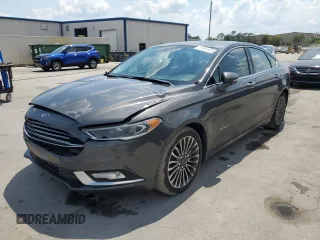 2017 Ford Fusion Hybrid Titanium with VIN 3FA6P0RU7HR285700, listed as a Copart auction lot 57561165 with 164,666 mi miles and Salvage title. Bid and sale history available at DreamBid. Image 1.