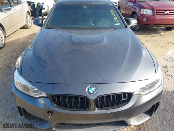 2015 BMW M4 with VIN WBS3R9C57FK334921, listed as a IAAI auction lot 41869773 with 107,058 mi miles. Bid and sale history available at carsss.com. Image 18.