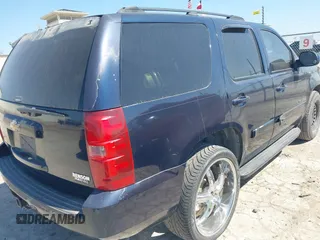 2007 Chevrolet Tahoe LTZ with VIN 1GNFC13017R285839, listed as a IAAI auction lot 42002091 with 210,039 mi miles and . Bid and sale history available at DreamBid. Image 4.