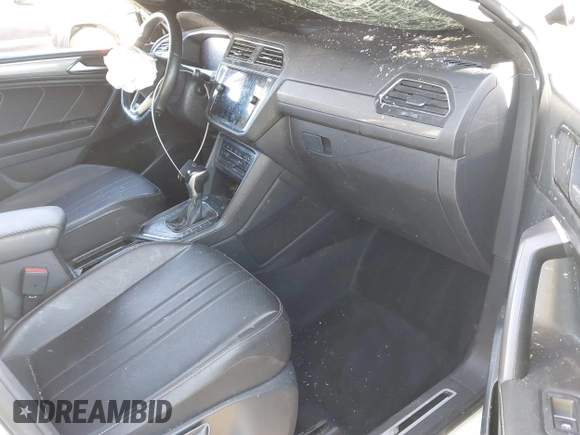 2022 Volkswagen Tiguan SE R-Line Black with VIN 3VVCB7AX1NM022655, listed as a IAAI auction lot 41319977 with 92,860 mi miles and . Bid and sale history available at DreamBid. Image 5.