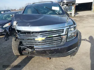 2016 Chevrolet Tahoe LTZ with VIN 1GNSKCKC7GR475458, listed as a IAAI auction lot 41831124 with 95,554 mi miles. Bid and sale history available at carsss.com. Image 12.