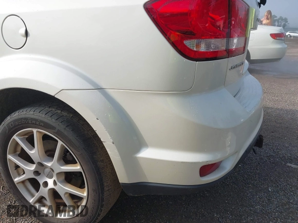 2013 Dodge Journey Crew with VIN 3C4PDCDG0DT591533, listed as a IAAI auction lot 42630548 with 164,961 mi miles and . Bid and sale history available at DreamBid. Image 19.