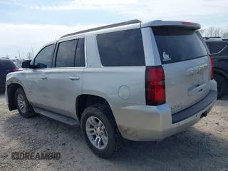 2015 Chevrolet Tahoe LT with VIN 1GNSCBKC4FR552034, listed as a IAAI auction lot 41891302 with 145,969 mi miles and . Bid and sale history available at DreamBid. Image 3.