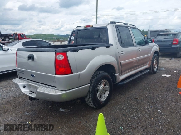 2004 Ford Explorer Sport Trac XLS with VIN 1FMZU77K44UB14590, listed as a IAAI auction lot 42375288 with 231,668 mi miles and . Bid and sale history available at DreamBid. Image 4.