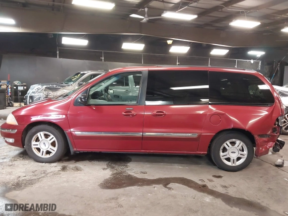 2002 Ford Windstar Wagon SE with VIN 2FMZA52442BB60882, listed as a IAAI auction lot 41621529 with 136,753 mi miles. Bid and sale history available at carsss.com. Image 14.