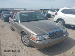 2003 Mercury Grand Marquis GS Convenience z VIN 2MEFM74W33X637135, wystawiony jako IAAI lot #42001834 z przebiegiem 146 184 mil mil oraz . Historia ofert i sprzedaży dostępna na DreamBid. Obrazek 1.