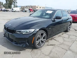 2022 BMW 3 Series 330e with VIN 3MW5P7J06N8C50460, listed as a IAAI auction lot 41688267 with 27,707 mi miles. Bid and sale history available at carsss.com. Image 17.