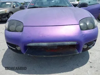 1999 Mitsubishi 3000GT z VIN JA3AM44H8XY003108, wystawiony jako IAAI lot #42374035 z przebiegiem 177 637 mil mil oraz . Historia ofert i sprzedaży dostępna na DreamBid. Obrazek 6.