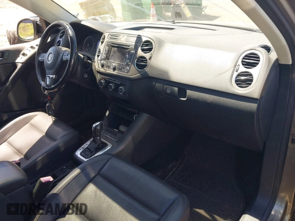2011 Volkswagen Tiguan SE with VIN WVGBV7AX8BW514320, listed as a IAAI auction lot 42138794 with 76,079 mi miles and . Bid and sale history available at DreamBid. Image 5.