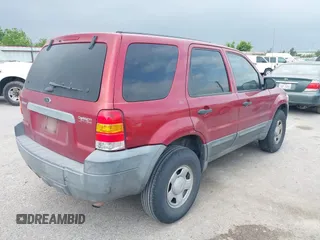 2005 Ford Escape XLS Value with VIN 1FMYU02Z35KB05027, listed as a IAAI auction lot 42025362 with 208,413 mi miles. Bid and sale history available at carsss.com. Image 4.
