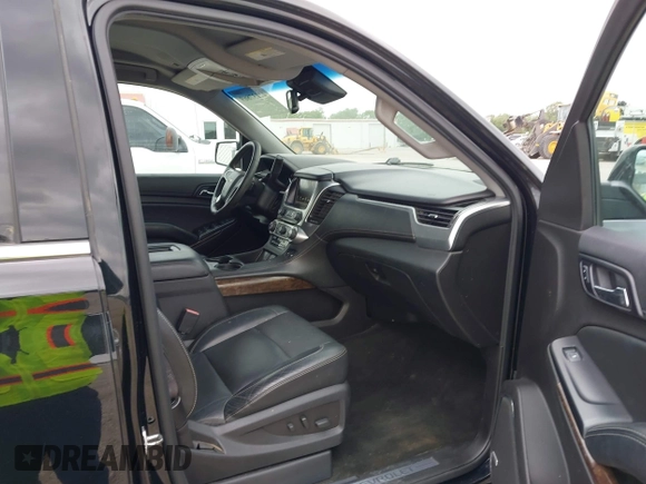 2016 Chevrolet Suburban LT with VIN 1GNSKHKC4GR233059, listed as a IAAI auction lot 42137869 with 115,571 mi miles. Bid and sale history available at carsss.com. Image 5.