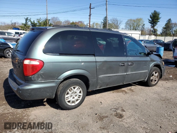 2004 Dodge Caravan SE with VIN 1D4GP24R04B520727, listed as a Copart auction lot 52002475 with 164,954 mi miles and Salvage title. Bid and sale history available at DreamBid. Image 3.