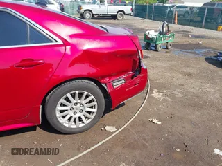 2011 Cadillac CTS Luxury with VIN 1G6DG5EY9B0146136, listed as a IAAI auction lot 42463083 with 182,324 mi miles and . Bid and sale history available at DreamBid. Image 6.