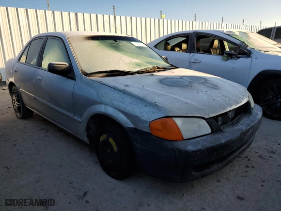 2000 Mazda Protege ES with VIN JM1BJ2213Y0266275, listed as a Copart auction lot 59480054 with 189,616 mi miles and Salvage Title. Bid and sale history available at carsss.com. Image 4.