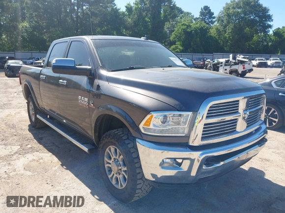 2015 Ram 2500 Laramie z VIN 3C6UR5FL6FG708769, wystawiony jako IAAI lot #42299173 z przebiegiem 101 660 mil mil oraz . Historia ofert i sprzedaży dostępna na DreamBid. Obrazek 1.