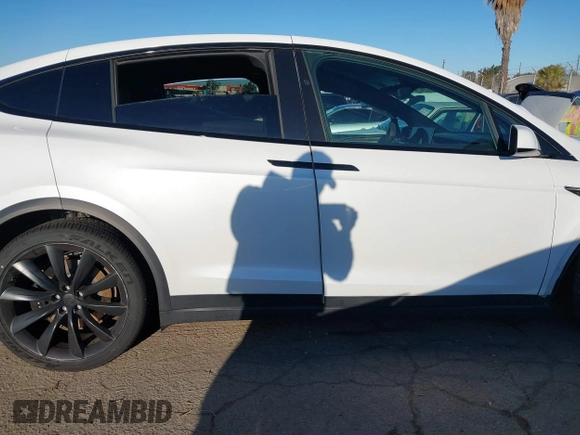 2022 Tesla Model X with VIN 7SAXCBE59NF364984, listed as a IAAI auction lot 41809256 with Not Provided miles and . Bid and sale history available at DreamBid. Image 14.