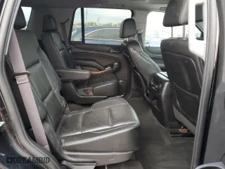 2015 Chevrolet Tahoe LTZ with VIN 1GNSKCKC1FR111115, listed as a Copart auction lot 52503395 with 140,753 mi miles and Clean Title. Bid and sale history available at carsss.com. Image 11.