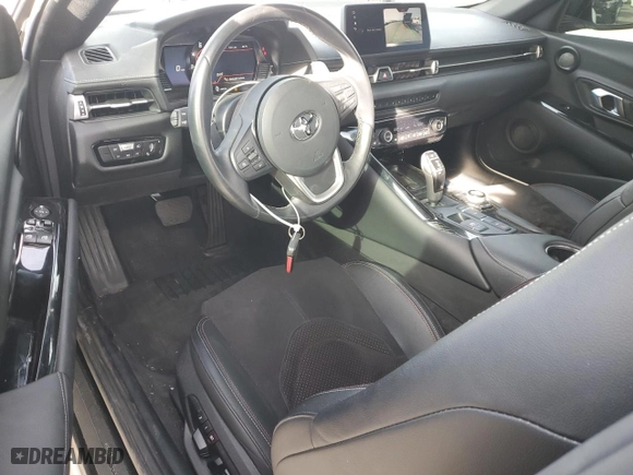 2023 Toyota GR Supra 3.0 with VIN WZ1DB0G00PW055929, listed as a Copart auction lot 76407574 with 16,889 mi miles and Salvage Title. Bid and sale history available at carsss.com. Image 8.
