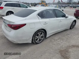 2019 Infiniti Q50 Luxe with VIN JN1EV7AP5KM512511, listed as a IAAI auction lot 42039355 with Not provided miles and . Bid and sale history available at DreamBid. Image 4.