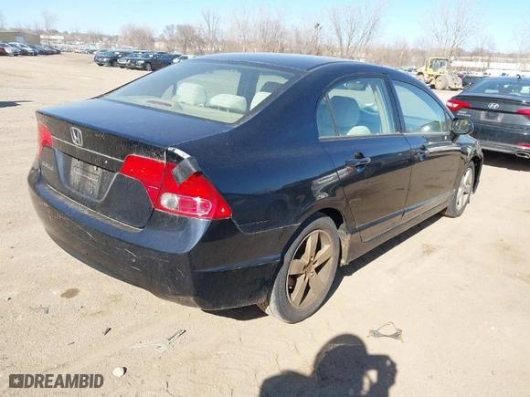 2006 Honda Civic Sdn EX with VIN 1HGFA16826L133698, listed as a IAAI auction lot 41870828 with 202,030 mi miles. Bid and sale history available at carsss.com. Image 4.