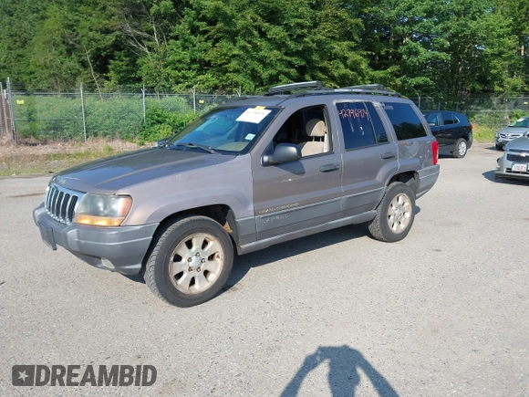 2001 Jeep Grand Cherokee Laredo with VIN 1J4GW48S31C626727, listed as a IAAI auction lot 42796974 with 132,988 mi miles and . Bid and sale history available at DreamBid. Image 2.