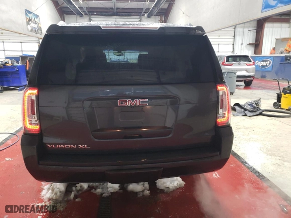 2015 GMC Yukon XL SLE with VIN 1GKS2GKC1FR258815, listed as a Copart auction lot 43360965 with 142,311 mi miles and Salvage Title. Bid and sale history available at carsss.com. Image 6.