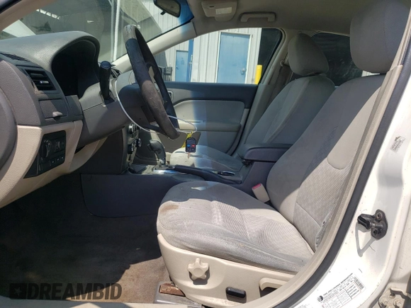 2010 Ford Fusion SE with VIN 3FAHP0HA6AR124387, listed as a Copart auction lot 62008405 with 196,524 mi miles and Salvage title. Bid and sale history available at DreamBid. Image 7.