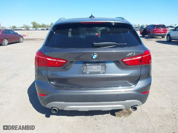 2017 BMW X1 xDrive28i with VIN WBXHT3C32H5F87341, listed as a IAAI auction lot 40798750 with 76,162 mi miles. Bid and sale history available at carsss.com. Image 16.