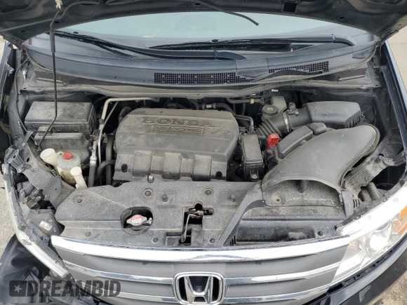 2013 Honda Odyssey EX-L with VIN 5FNRL5H61DB019930, listed as a Copart auction lot 54666775 with 175,300 mi miles and Salvage title. Bid and sale history available at DreamBid. Image 12.