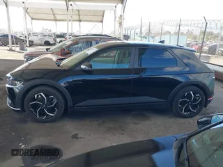 2024 Hyundai Ioniq 5 SE z VIN KM8KM4DE5RU246280, wystawiony jako IAAI lot #41506472 z przebiegiem 15 679 mil mil oraz . Historia ofert i sprzedaży dostępna na DreamBid. Obrazek 14.