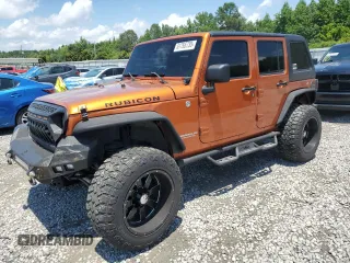 2011 Jeep Wrangler Unlimited Rubicon with VIN 1J4HA6H12BL584493, listed as a Copart auction lot 61765735 with 151,175 mi miles and Salvage title. Bid and sale history available at DreamBid. Image 1.