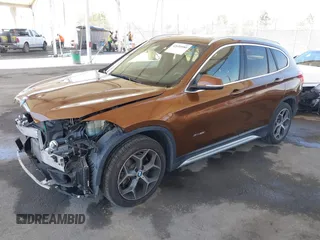 2017 BMW X1 xDrive28i with VIN WBXHT3C34H5F75885, listed as a IAAI auction lot 42655580 with 54,609 mi miles and . Bid and sale history available at DreamBid. Image 2.