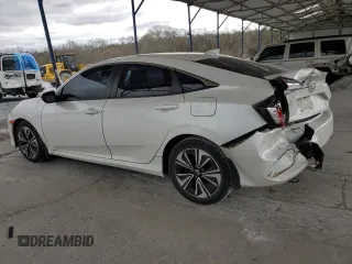 2017 Honda Civic EX-L z VIN 19XFC1F77HE013049, wystawiony jako Copart lot #49931525 z przebiegiem 124 721 mil mil oraz Szkoda całkowita • Salvage title. Historia ofert i sprzedaży dostępna na DreamBid. Obrazek 2.