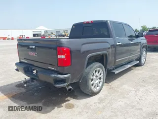 2014 GMC Sierra 1500 Denali with VIN 3GTU2WEC3EG390936, listed as a IAAI auction lot 42253577 with 196,852 mi miles and . Bid and sale history available at DreamBid. Image 4.