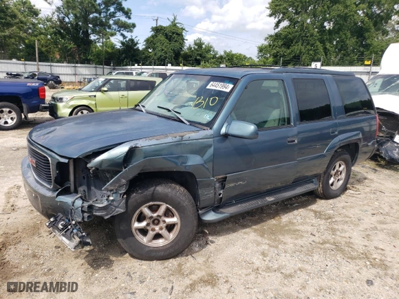 1999 GMC Denali with VIN 1GKEK13R5XR906686, listed as a Copart auction lot 64451994 with 273,180 mi miles and Salvage Title. Bid and sale history available at carsss.com. Image 1.