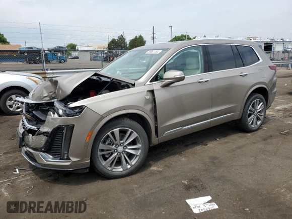 2022 Cadillac XT6 Premium Luxury with VIN 1GYKPDRS5NZ180296, listed as a Copart auction lot 59081184 with 21,380 mi miles and Salvage title. Bid and sale history available at DreamBid. Image 1.