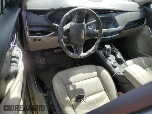 2019 Cadillac XT4 FWD Premium Luxury z VIN 1GYFZCR42KF147440, wystawiony jako Copart lot #45549835 z przebiegiem Nie podano mil oraz Szkody całkowita. Historia ofert i sprzedaży dostępna na DreamBid. Obrazek 8.