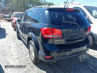 2017 Dodge Journey SXT with VIN 3C4PDCBG5HT604947, listed as a IAAI auction lot 41851008 with 208,674 mi miles and . Bid and sale history available at carsss.com. Image 3.