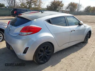 2012 Hyundai Veloster w/Gray Int with VIN KMHTC6AD0CU068400, listed as a IAAI auction lot 41493521 with 72,682 mi miles and . Bid and sale history available at DreamBid. Image 4.