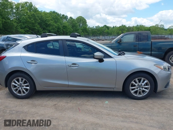 2014 Mazda 3 i Touring z VIN JM1BM1L70E1101262, wystawiony jako IAAI lot #42205168 z przebiegiem 152 069 mil mil oraz . Historia ofert i sprzedaży dostępna na DreamBid. Obrazek 13.