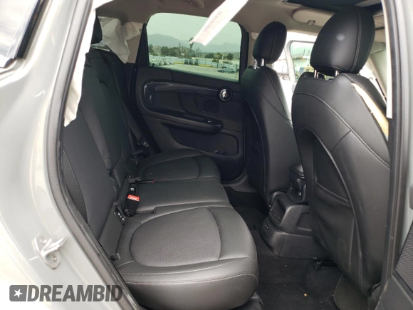 2019 MINI Countryman Cooper S with VIN WMZYT3C56K3E97143, listed as a Copart auction lot 62315533 with 0 mi miles and Salvage Title. Bid and sale history available at carsss.com. Image 10.